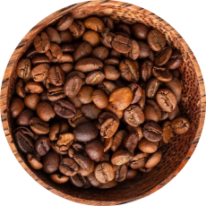 An image of Arabica beans in a wooden bowl