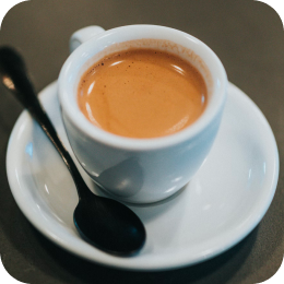 White espresso cup filled with espresso